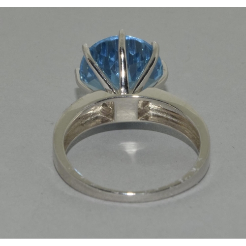 445 - A silver Blue Topaz ring, Size