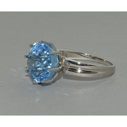 445 - A silver Blue Topaz ring, Size