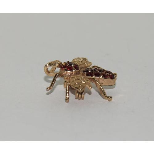 327 - 9ct Gold Ruby bee brooch.