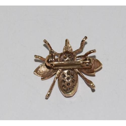 327 - 9ct Gold Ruby bee brooch.