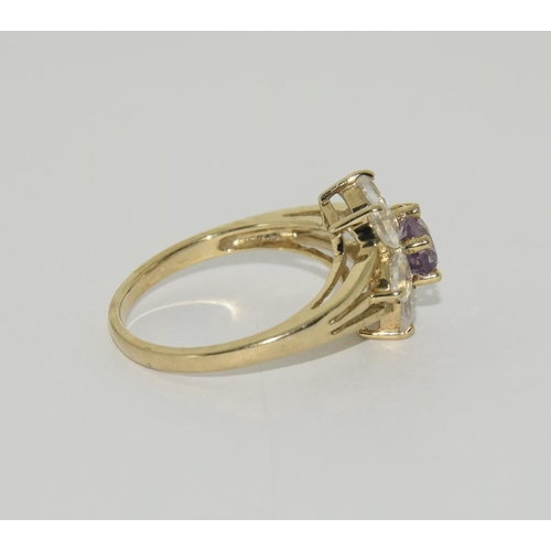 478 - 9ct Gold moonstone amethyst ring. Size N 1/2.