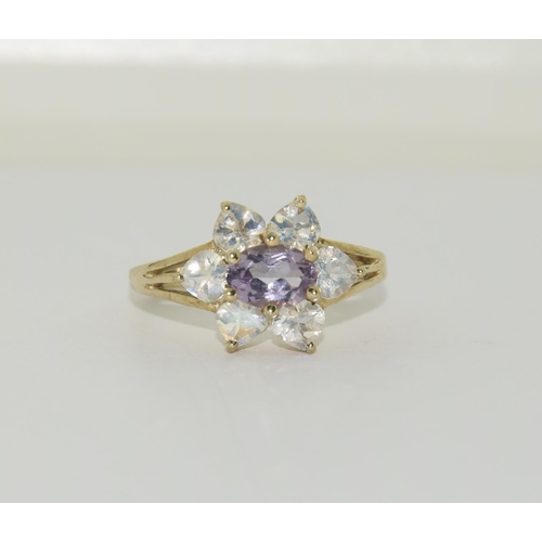 478 - 9ct Gold moonstone amethyst ring. Size N 1/2.