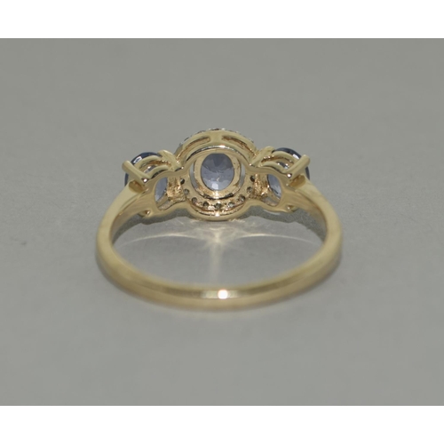 494 - A 9ct gold Ceylon Sapphire and Diamond ring Size N