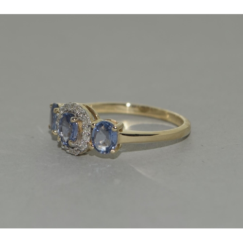 494 - A 9ct gold Ceylon Sapphire and Diamond ring Size N