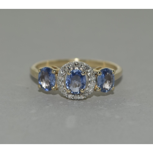 494 - A 9ct gold Ceylon Sapphire and Diamond ring Size N