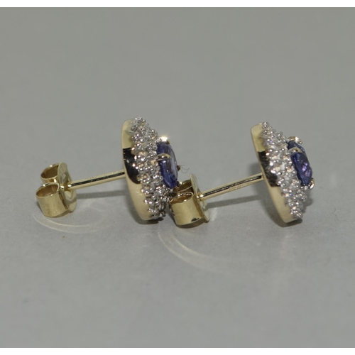 468 - A pair of  9ct gold Tanzanite and Zircon earrings.