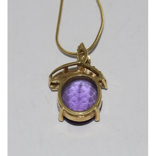 488 - 18ct Gold Amethyst Diamond pendant on 9ct Gold chain.