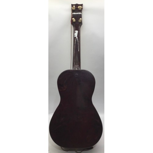 379 - 1950S SELCO ELVIS PRESLEY GUITAR. This is a 4 string guitar with 17 frets. There is slight damage to... 