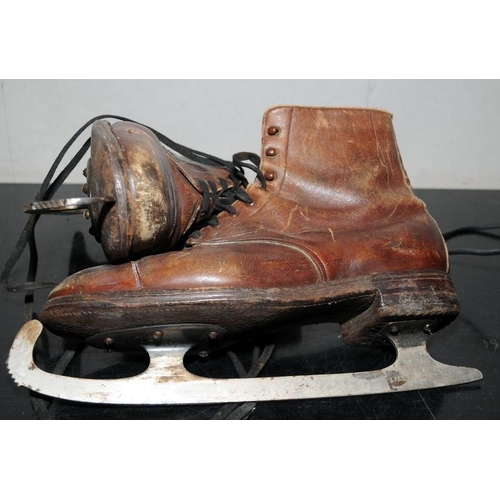 160 - A pair of quality antique Lillywhites Criterion ice skates with tan leather uppers. Adult size 8 1/2