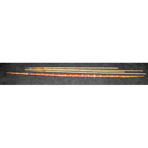 18 - Collection of tribal bow and arrows and short handled spear