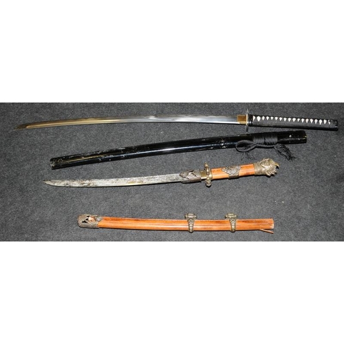 19 - Collection of contemporary decorative swords and a musket