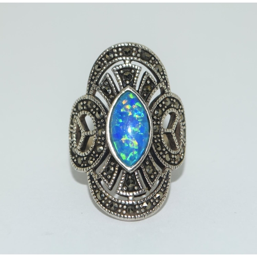 400 - A silver opal and marcasite ring Size O