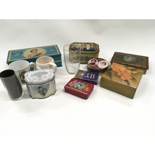 29 - A collection of Royal commemorative tins etc.