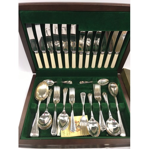 373 - A collection of silver plated/stainless steel flatware.