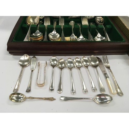 373 - A collection of silver plated/stainless steel flatware.