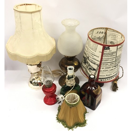 144 - Collection of vintage lighting to include bedside lamps and two oil lamps (6).