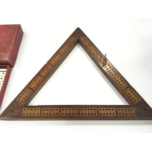 61 - Vintage travelling chess set together with a vintage cribbage board (2).