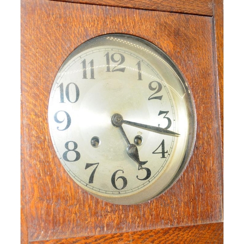 235 - Vintage oak cased chiming wall clock