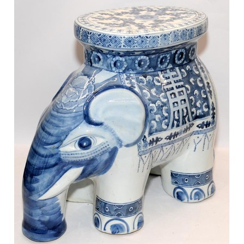 180 - Blue and white ceramic side table/stool in the form of an elephant. 37cms tall