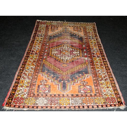 291 - Vintage hearth rug with age related wear. 195cms x 120cms