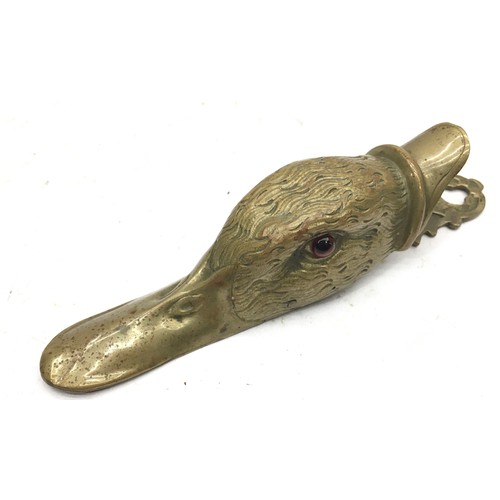 120 - Vintage brass items: A duck head paper tidy and a squirrel nutcracker