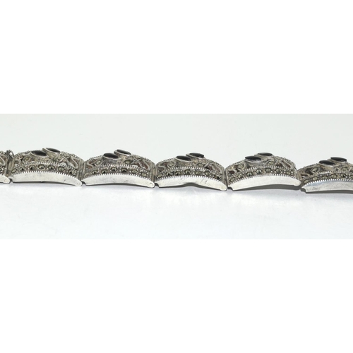 311 - Silver filigree design marcasite and jet bracelet