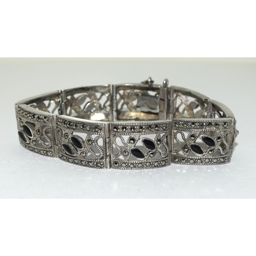 311 - Silver filigree design marcasite and jet bracelet