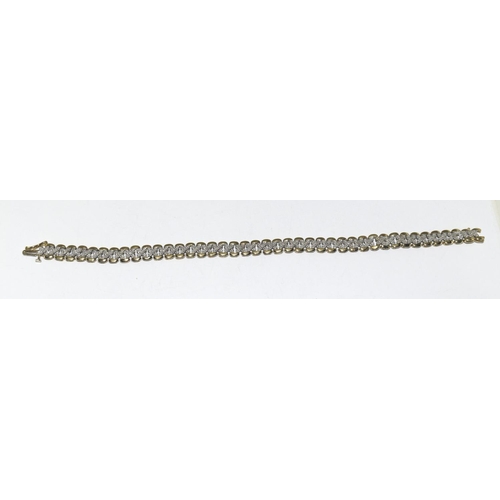 352 - 9ct gold diamond set bracelet 10g