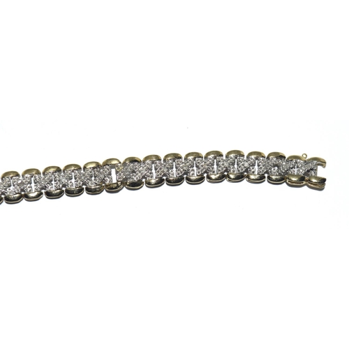 352 - 9ct gold diamond set bracelet 10g