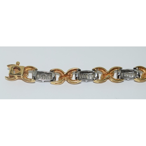 347 - Superb 18ct two tone gold ladies diamond set diamond bracelet set with Baguette diamonds approx 2ct