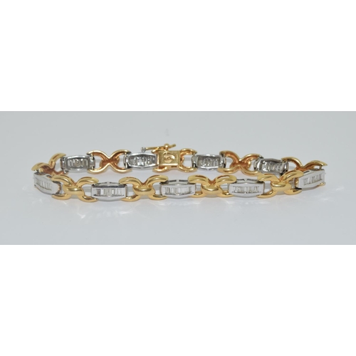 347 - Superb 18ct two tone gold ladies diamond set diamond bracelet set with Baguette diamonds approx 2ct