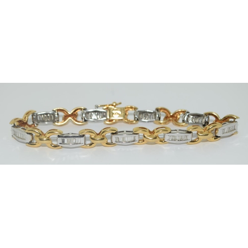 347 - Superb 18ct two tone gold ladies diamond set diamond bracelet set with Baguette diamonds approx 2ct