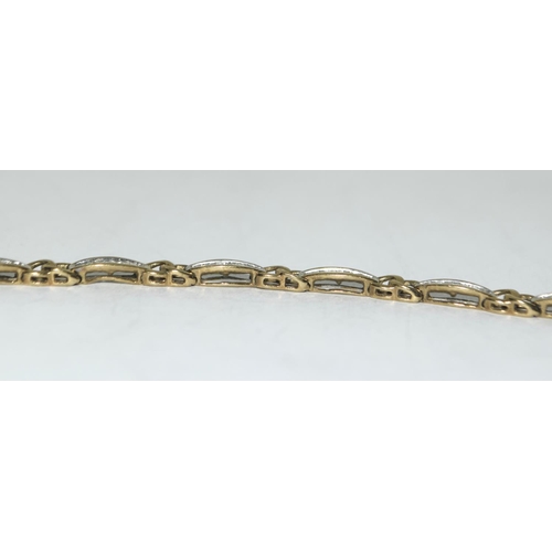 404 - 9ct gold ladies Diamond bracelet of approx 2ct set with bagget cut diamonds