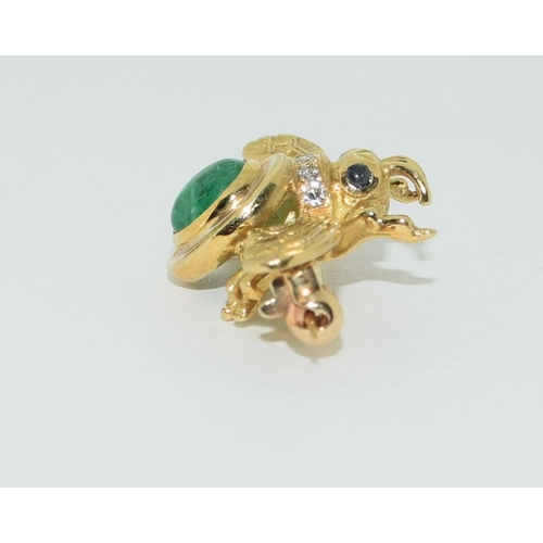 322 - 18ct gold tested Cabochon emerald and diamond bug brooch