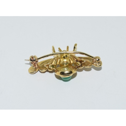 322 - 18ct gold tested Cabochon emerald and diamond bug brooch