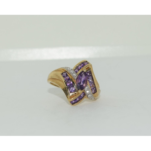 312 - 9ct gold ladies Amethyst and Diamond shoulder Twist ring size N