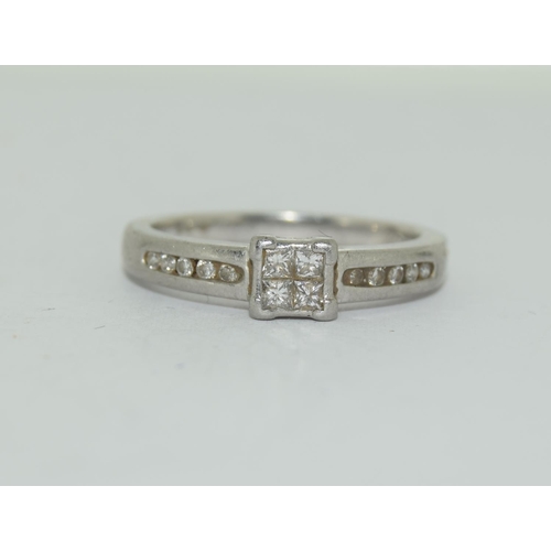 384 - Platinium ladies diamond ring set with diamond shoulders H/M in ring as 0.25ct size L