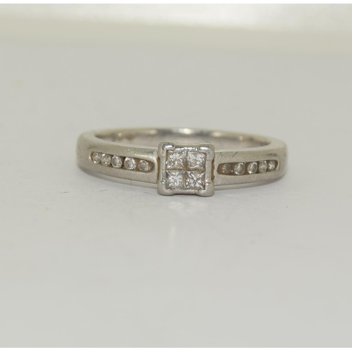 384 - Platinium ladies diamond ring set with diamond shoulders H/M in ring as 0.25ct size L