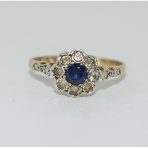 344 - 9ct gold ladies Diamond and Sapphire daisy ring size O