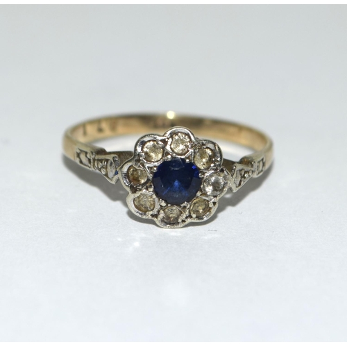 344 - 9ct gold ladies Diamond and Sapphire daisy ring size O