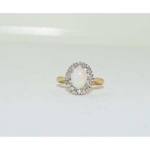 309 - 14ct gold ladies Diamond and Opal ring size J