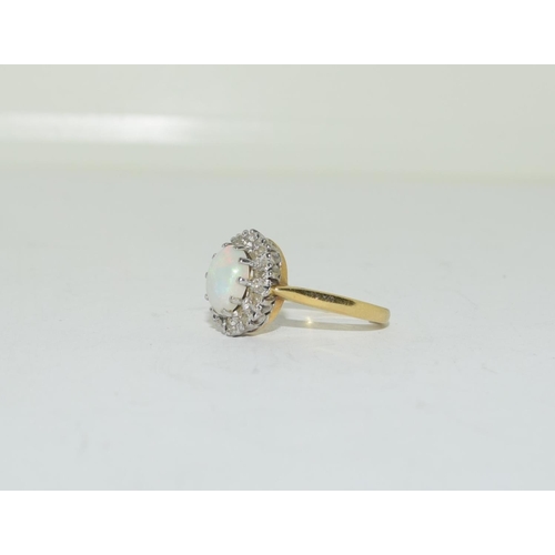 309 - 14ct gold ladies Diamond and Opal ring size J