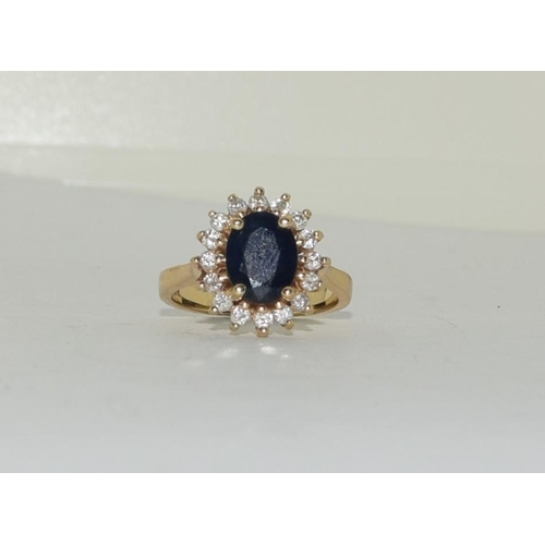 319 - 14ct gold ladies Princess Diana Sapphire and Diamond cluster ring size N