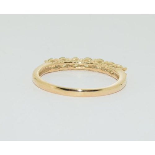 443 - 9ct Gold 7 stone yellow diamond 1/2 eternity ring, N