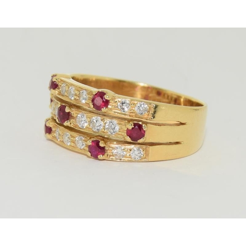 423 - 18ct Ruby and diamond ring, Size N.