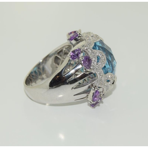 452 - 18ct Gold ladies Topaz and Amethyst ring.