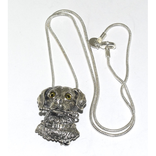 411 - Silver dogs head necklace / brooch with glass eyes.