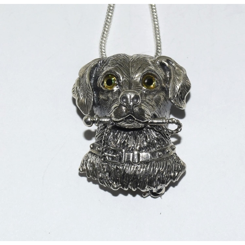 411 - Silver dogs head necklace / brooch with glass eyes.