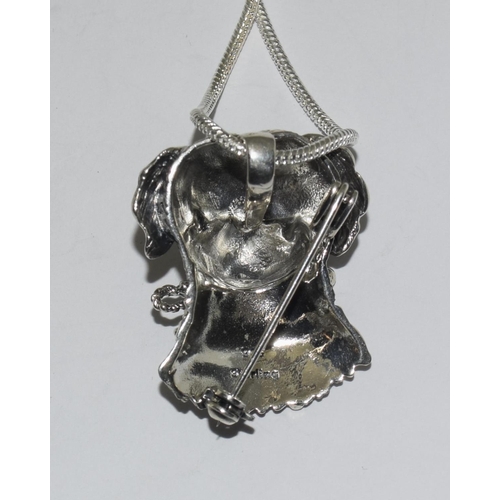 411 - Silver dogs head necklace / brooch with glass eyes.