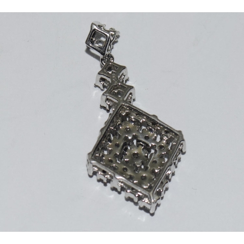 424 - Silver fancy Diamond pendant.